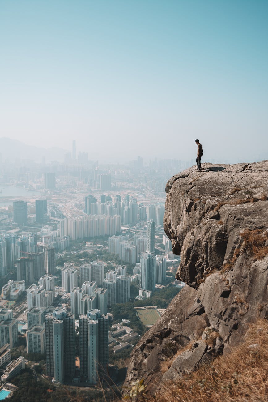 man standing on cliff